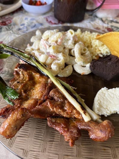 A plate of food on a table
AI-generated content may be incorrect.